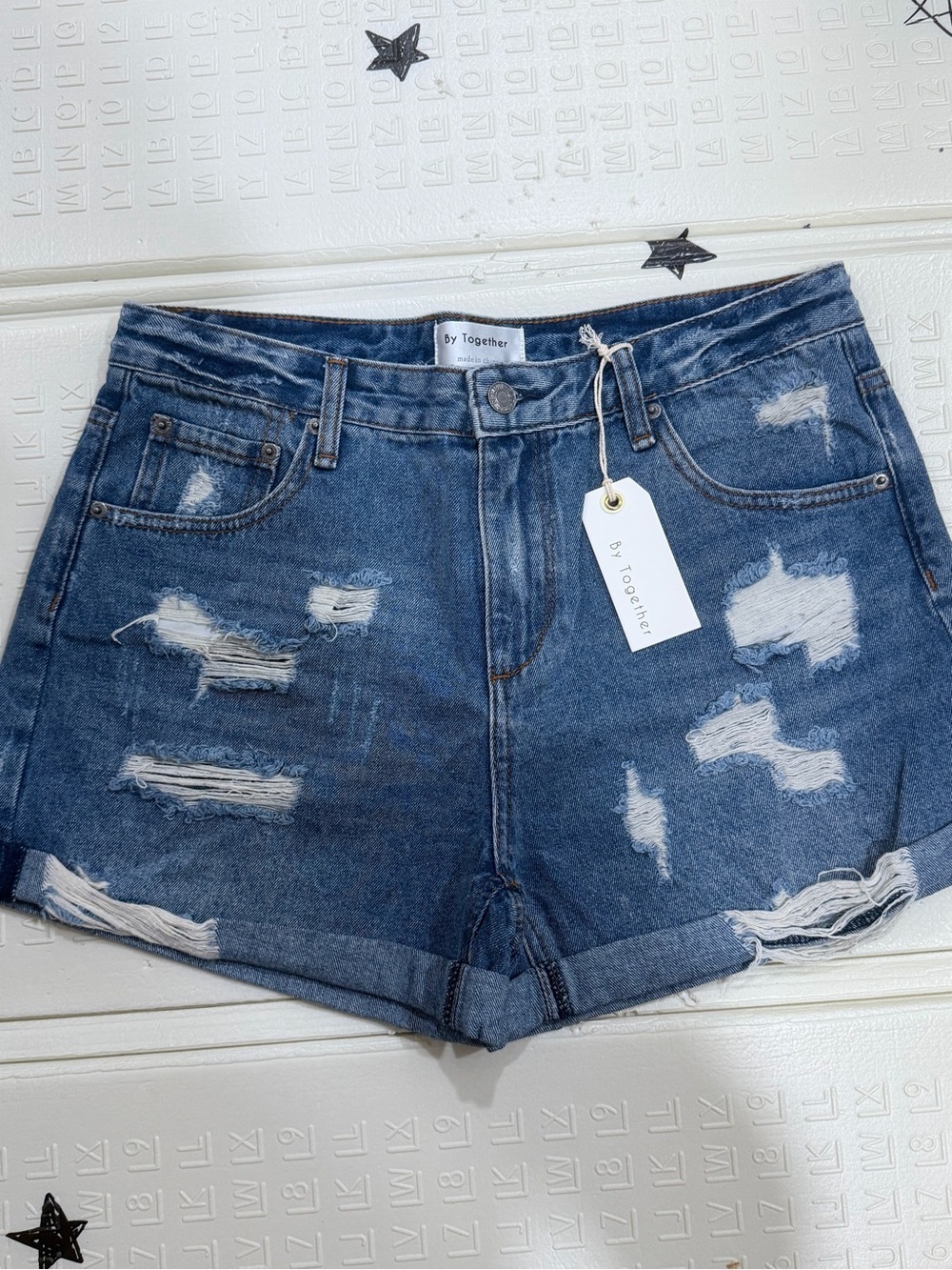 By Together Distressed Denim Cutoff Shorts in Blue Wash